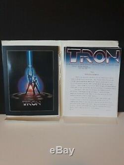 Vintage 1982 Disney's TRON press kit with 20 B&W movie photos & productions notes