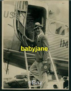 WALT DISNEY VINTAGE 7X9 PHOTO EARLY CANDID BOARDING AIRPLANE With MOVIE CAMERA