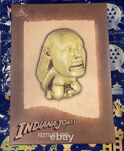 Figurine de l'idole de la fertilité des Parcs Disney Indiana Jones et Les Aventuriers de l'Arche perdue.