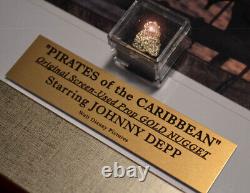 JOHNNY DEPP a signé PIRATES DES CARAÏBES DISNEY PROP Pépite d'or & PIÈCE, COA, DVD